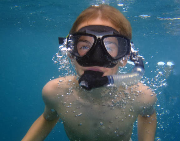 Happy snorkeller - click to go to Snorkelling page