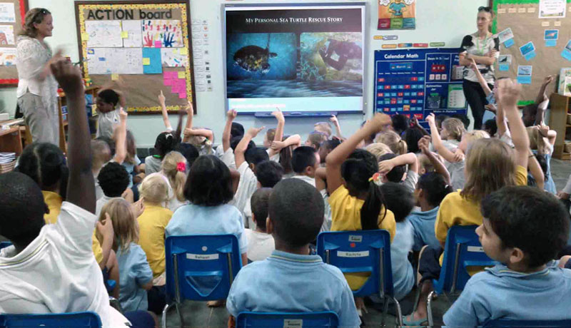 Instructor Tammy sharing one of her seaturtle rescue stories with kindergarten students