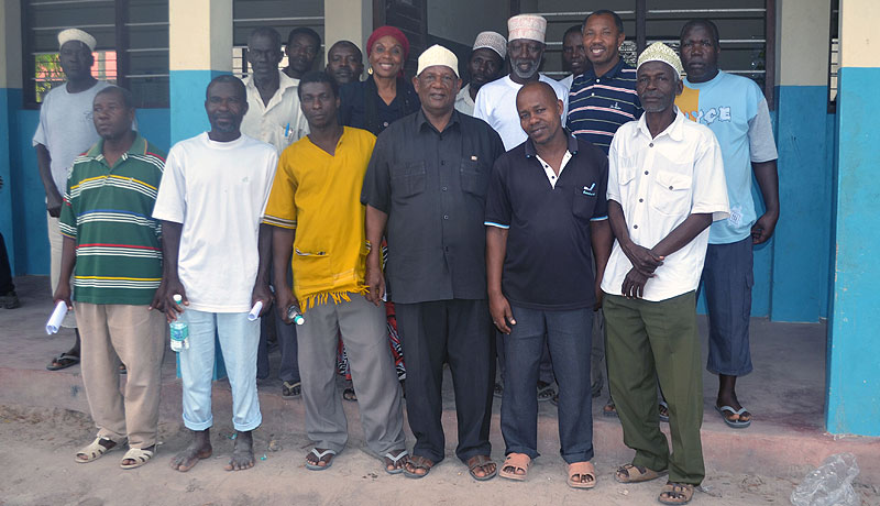 Scuba Do Zanzibar Divemaster posing with Zanzibar government authorities and key stakeholders at World Tourism Day in Nungwi, Zanzibar